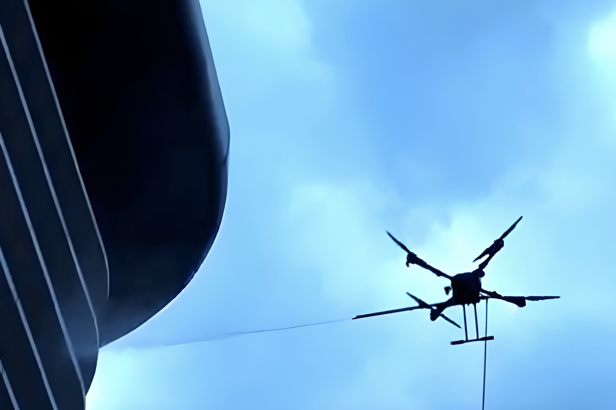 Autonomous facade cleaning drone on skyscraper