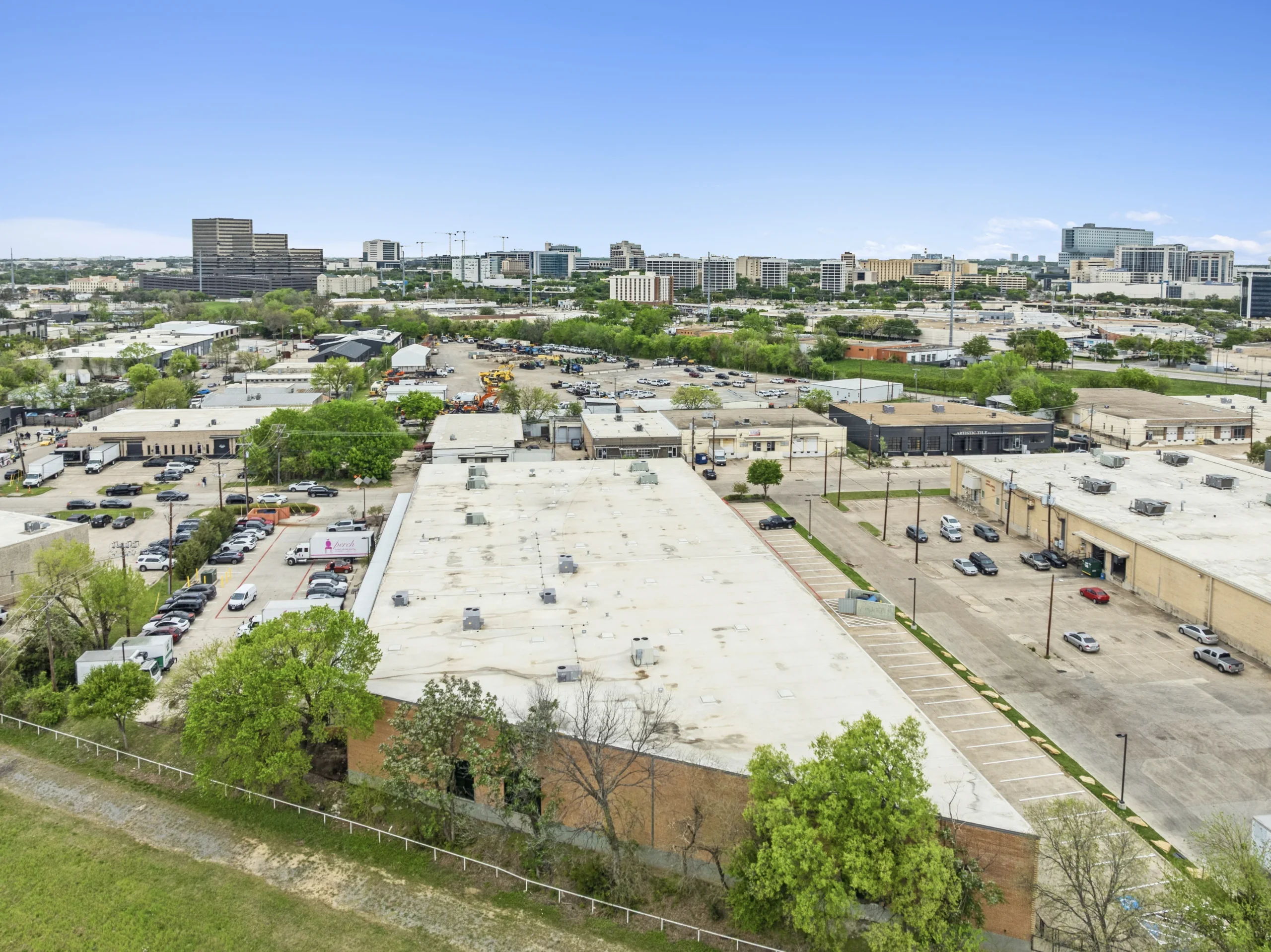 Aerial drone photography of bulk distribution warehouse with trailer staging area