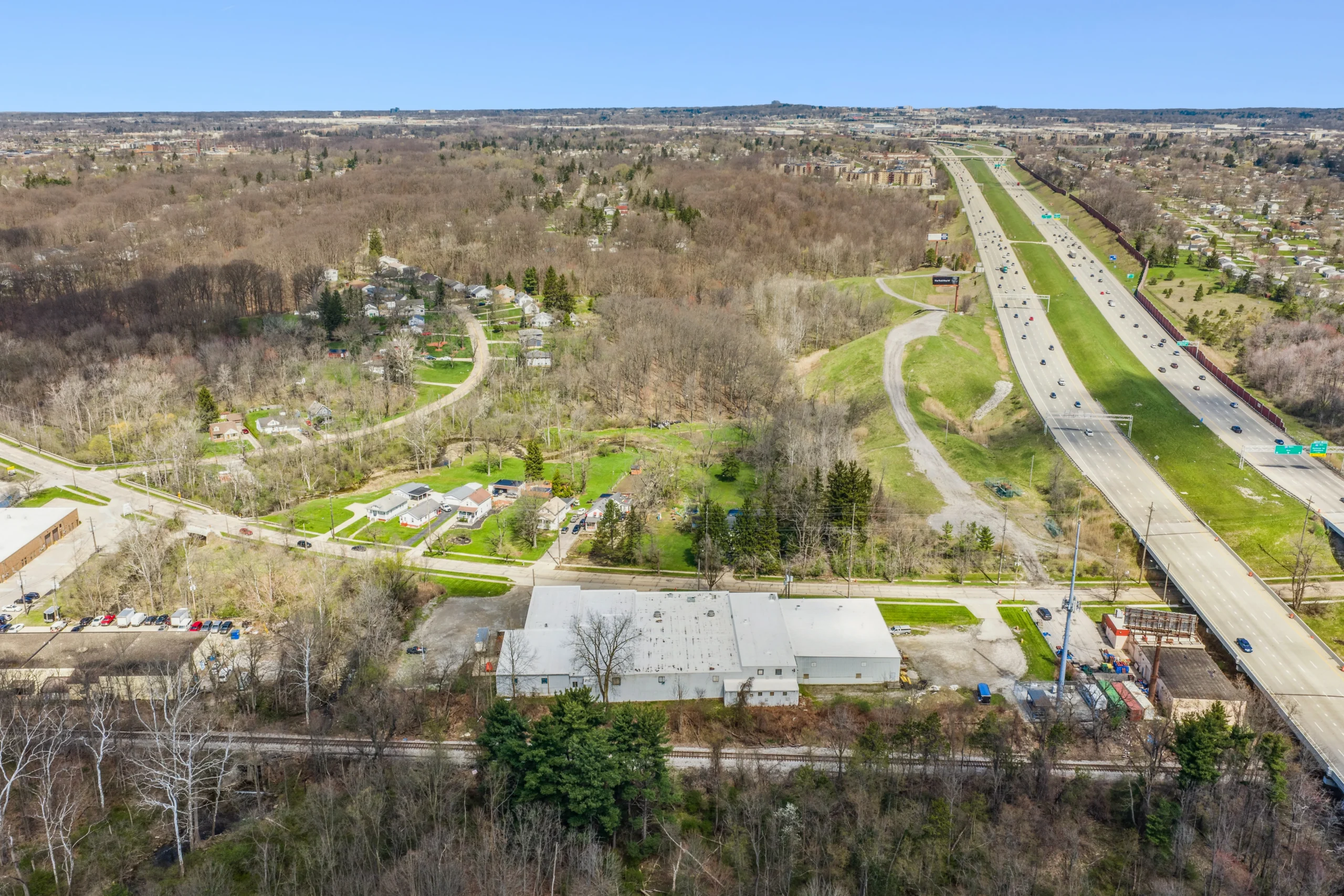 Aerial drone photography of last-mile industrial distribution facility near residential