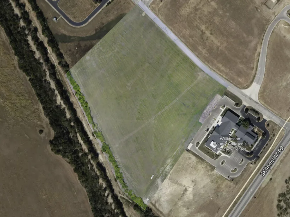 Construction site drone progress capture showing early project site conditions