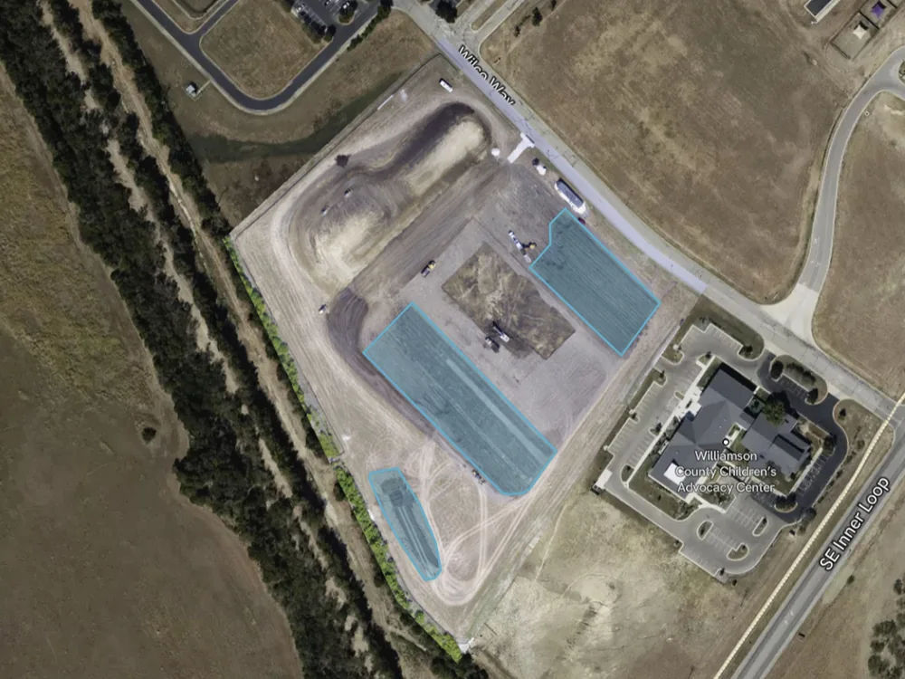 Construction site drone progress capture showing active site development