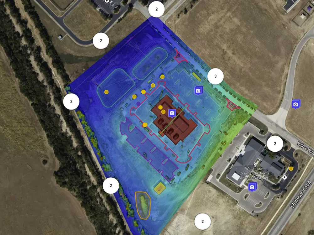 Construction site drone progress capture showing advanced construction progress