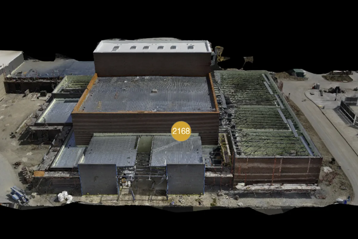 Drone 3D facade model showing building measurements for inspection and documentation